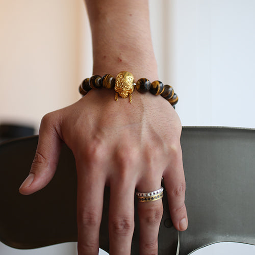 Pirates of the Caribbean: Dead Men Tell No Tales Skull Bracelet in Tiger Eye - 18K Yellow Gold